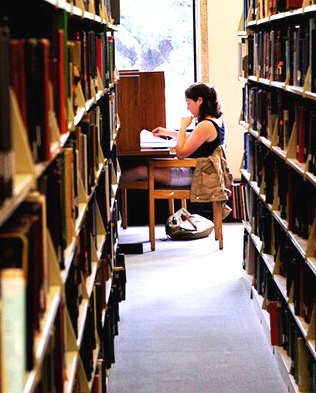 Image of a person studying at a desk