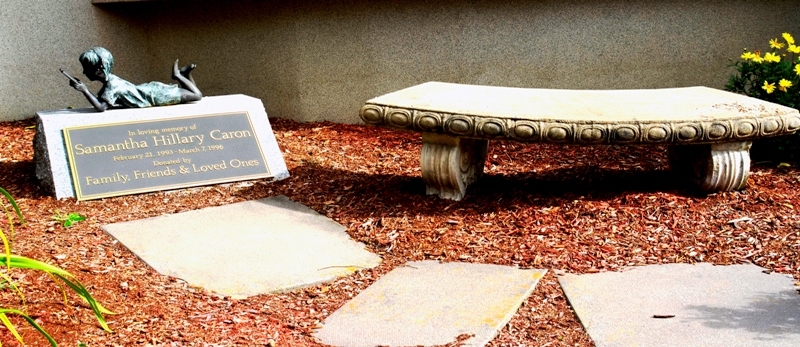 Photograph of donated statue of a girl reading