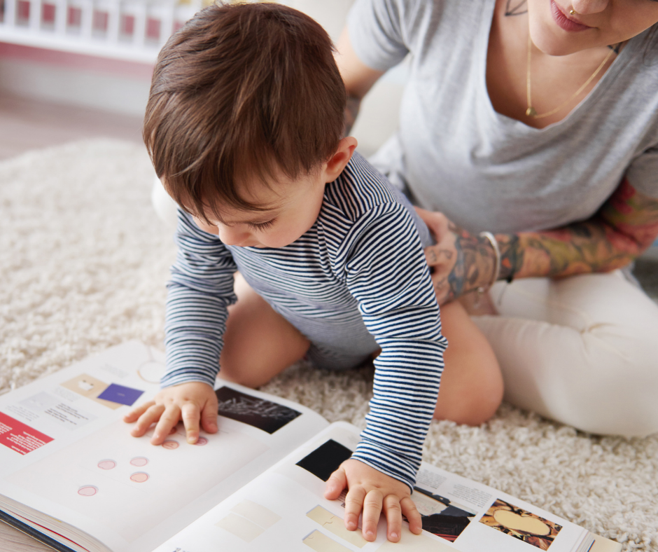 Image of a mother and toddler reading a book